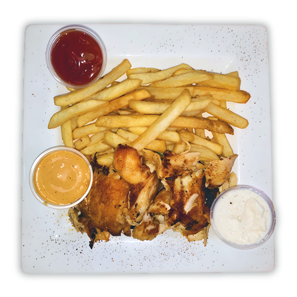 Plate of fried chicken with French fries and three dipping sauces ketchup orange sauce and ranch on a white square plate with a dark background